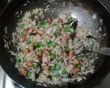 A picture of step 4 of Matar Pulao.