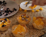 Foto del paso 9 de la receta: Tartaletas con yogur, melocotón y arándanos