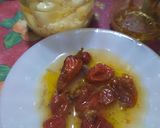 Foto del paso 4 de la receta: Aceite de ajo y ajíes P.P. (10 XL picante)