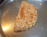 A picture of step 6 of Mexican chicken Quesadilla.
