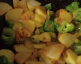 A picture of step 3 of Dry spices patato capcicum.