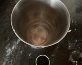 A picture of step 4 of Choco marble Donuts.