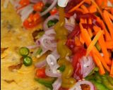 A picture of step 10 of Beloved Egg Chicken (Kathi) Roll.
