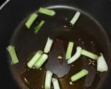 Foto del paso 1 de la receta: Garbanzos fritos con ajetes