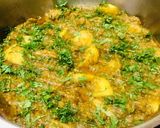 A picture of step 11 of Alu baigan.