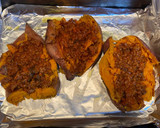 Foto del paso 3 de la receta: Boniatos rellenos de boloñesa