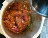A picture of step 7 of Brinjal Patchadi.