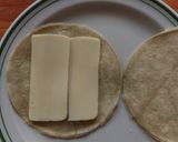 A picture of step 5 of Quesadilla with Squash Blossoms and Mushrooms.