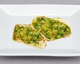 A picture of step 5 of Stir fried Cabbage, green peas, bok choy stuffed Pita bread.