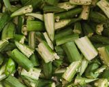 A picture of step 1 of Masala bhindi.