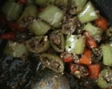 A picture of step 3 of 2minutes green &red chilli pickle.