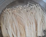 A picture of step 1 of Stir-Fried Enoki Mushrooms and Tofu with Oyster Sauce.