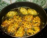 A picture of step 13 of Allu mung dal ka snack.