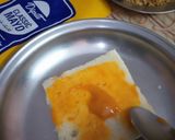 A picture of step 7 of Peri Patakha Chicken Sandwich Cake.
