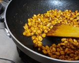 A picture of step 5 of Mall PVR style spicy corn black salt butter masala.