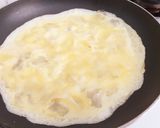 A picture of step 2 of Potato omelette Sandwich.