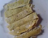 A picture of step 2 of Deep fried Egg fingers.