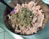Une image de l'étape 15 de Courgettes farcies carotte jambon emmental.