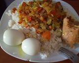 A picture of step 1 of White rice with turmeric, tomatoes sauce & Egg.