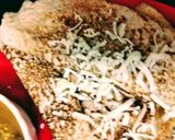 A picture of step 2 of Cheese Dosa with coconut chutney and sambar.