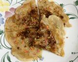 A picture of step 8 of Coconut Jaggery Stuffed Pancakes.