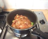 A picture of step 6 of Stew boneless chicken breast with 3 cups sauce.