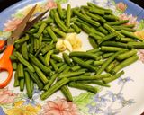 A picture of step 1 of Garlic French Beans-the easiest side possible (No chopping two ingredient recipe).