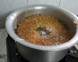 A picture of step 2 of Rajasthani ghevar with white chocolate ganache.