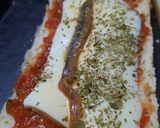 Foto del paso 5 de la receta: Pizza de pan, jamón y queso cuartirolo