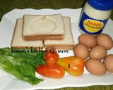A picture of step 1 of Egg in a hole sandwich.