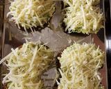 A picture of step 7 of Cheese and broccoli baked potatoes.