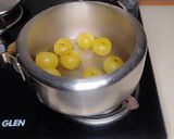 A picture of step 2 of Amla Ki Launji (amla and jaggery).