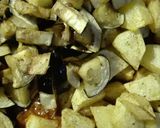 A picture of step 9 of Aaloo Began (Brinjal) Fry.