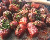 A picture of step 14 of Meat balls and beef sausages bitings in sauce.