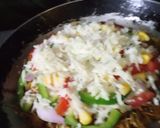 A picture of step 4 of Maggi pizza.