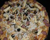 صورة لخطوة 6 من وصفة بيتزا بالسوسيس 🍕🍕