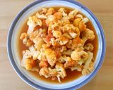 A picture of step 6 of Cauliflower and Tomato Stir-Fry.
