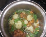A picture of step 1 of Hyderabadi blanched with veggies and creamy makhni gravy.