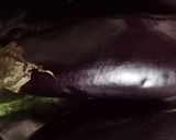 A picture of step 1 of Mashed brinjals with bajra roti baingan ka bartha and bajre ki roti.