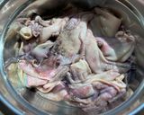A picture of step 1 of Sprite Adobong Pusit.