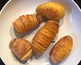 A picture of step 1 of Easy hasselback new potatoes.