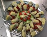 Une image de l'étape 9 de Salade de coeurs d'artichauts aux tomates, concombre et fleurs de thym.