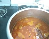 A picture of step 1 of Tomato Rice with boondi Raita.