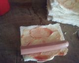 Une image de l'étape 2 de Roulé de pain de mie au saucisse.