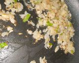 A picture of step 5 of Anda Bhurji.