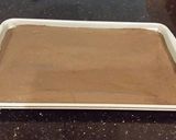 A picture of step 6 of Chocolate Layer Torte with Coconut Cream Filling and Frosting.