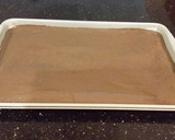 A picture of step 6 of Chocolate Layer Torte with Coconut Cream Filling and Frosting.
