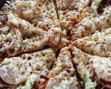 A picture of step 3 of Ragi thepla pizza.