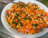 A picture of step 15 of Colorful Salad with White Rice, Carrots, Peas, Tomato, Radishes, and Cilantro.