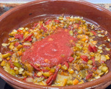 Foto del paso 3 de la receta: Arroz meloso de pulpo y gambones al ajillo